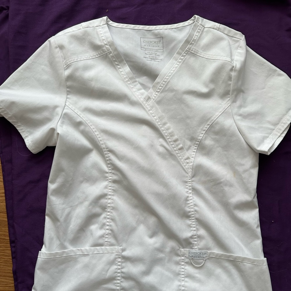 White womans scrub top